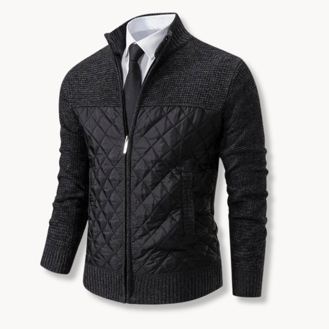 Black quilted jacket with a white shirt and tie on a white background